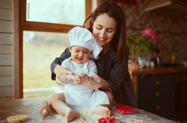 The mother and son playing with flour