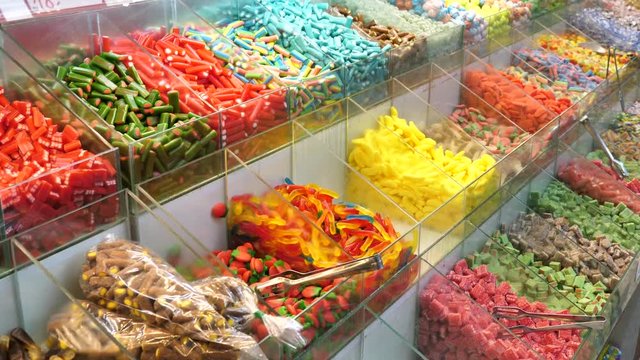 Assorted colorful jelly candies on display at a local food market