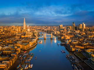 London, England - Aerial skyline view of London including iconic Tower Bridge with red...