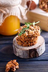 A fragrant flower tea with delicious cookies on the dark table