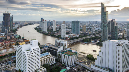 Obraz premium Bangkok City - Aerial view Chao Phraya River Bangkok city urban downtown skyline of Thailand , Cityscape Thailand