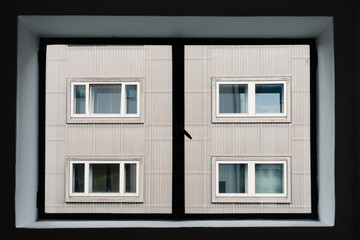 Windows framed by window. Looking through window