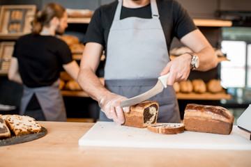 Bread seller working at the bakery shop