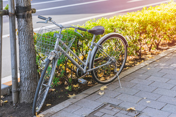 Obraz premium Old bicycle vintage style parking in japan metro