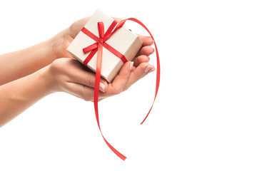 Woman hands holds present gift box