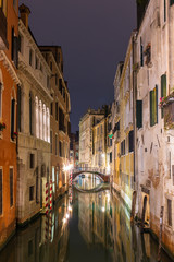 Fototapeta na wymiar Canal at night in Venice, Italy.