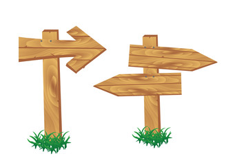 Wooden signpost standing in grass set isolated