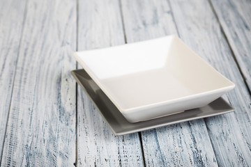 empty rectangular Plate on wooden table background