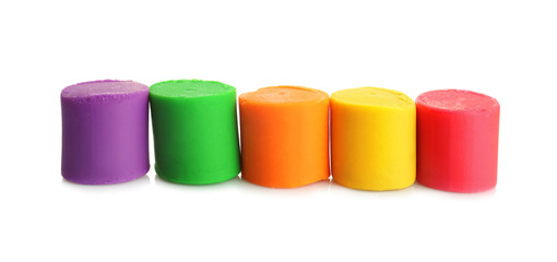 Colorful play dough on white background