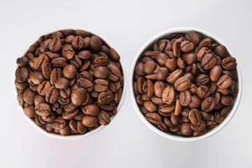 paper cup filled with coffee beans