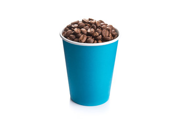 paper cup filled with coffee beans