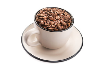 ceramic cup filled with roasted coffee beans