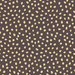 Seamless background with random golden elements. Abstract ornament. Dotted abstract pattern