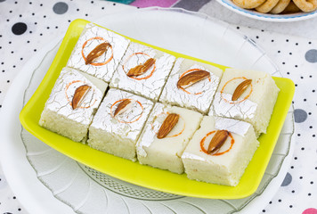 Indian Sweet Food Badam Barfi Also Know As Mithai, barfee, Mawa Barfi, Mava barfi, Almond Sweet, khoya Burfi Indian Popular Sweet Made up of Coconut, Mawa, Milk and Sugar
