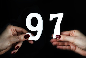 To female hands the figure of ninety-seven.
