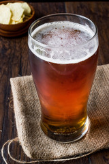 Cool Refreshing Amber Beer with Snacks.