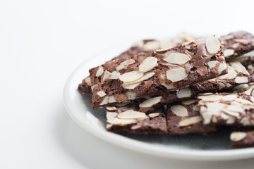 Brownie Cracker with Almond Slides on White Background