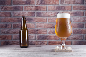 glass and bottle of beer