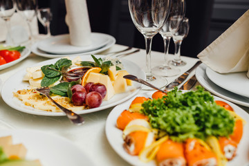 Served dishes to the table for holiday.