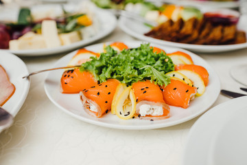 catering table set service with silverware and glass stemware at