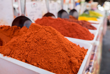 Paprika is a ground spice made from dried red bell pepper sold at local market