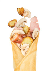 Pancake with ham, bacon and mushrooms. Ingredients in flight.