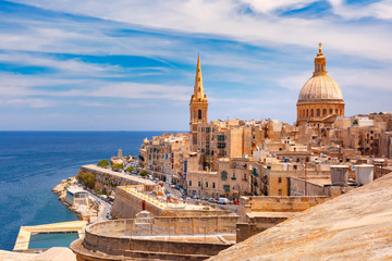 View from above of roofs and church of Our Lady of Mount Carmel and St. Paul's Anglican Pro-Cathedral, Valletta, Capital city of Malta - obrazy, fototapety, plakaty