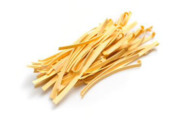 raw tagliatelle macaroni isolated