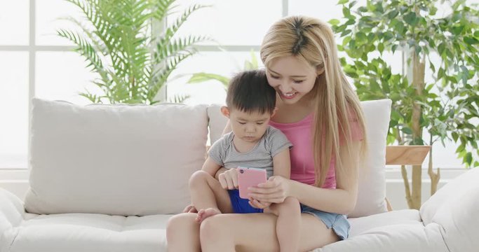mommy use phone with son