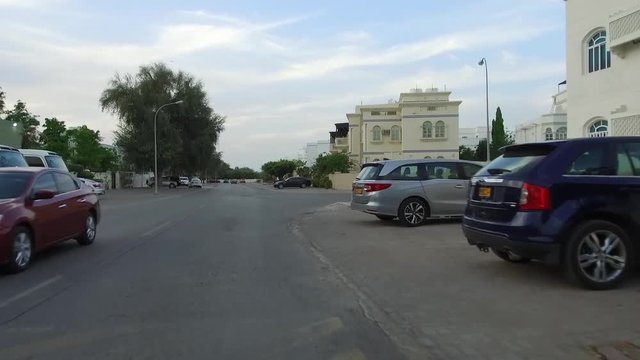 View driving on the city of Muscat Roads, Oman, Middle East, GCC  Vehicle point-of-view driving on Muscat Coastal highway beach road Azaiba and Ghubra