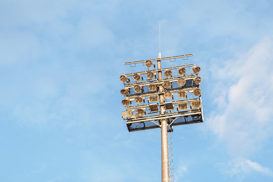 Stadium Lights At Daytime On The Sunset Sky Background