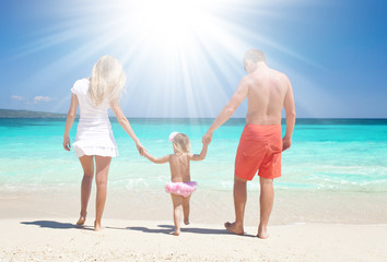 Happy family on tropic vacation