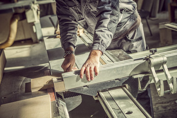 Man working with wood in the workshop