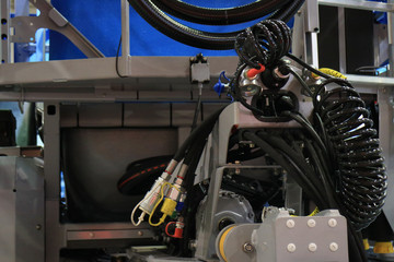 Coupler of the agricultural trailer. Assembly of hydraulic mechanisms.
