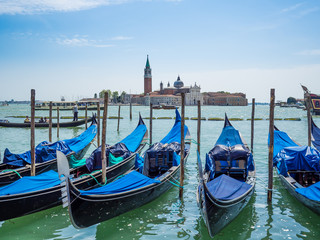 Fototapeta na wymiar Venice, Italy, Gondolas moored near Saint Mark's Square (Piazza