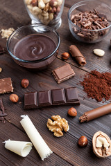 Delicious chocolate on wooden background