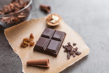 Delicious chocolate on rustic background