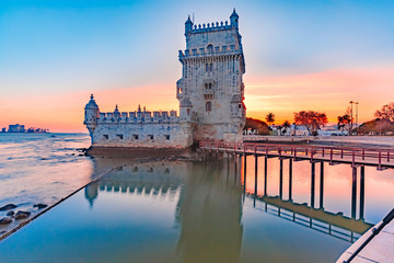 Belem Tower or Tower of St Vincent on the bank of the Tagus River at scenic sunset, Lisbon, Portugal