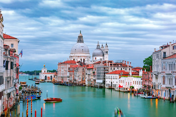 Naklejka premium Grand canal and The Basilica of St Mary of Health or Basilica di Santa Maria della Salute at night in Venice, Italy
