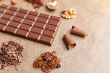 Delicious chocolate bar and ingredients