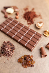 Delicious chocolate bar and ingredients