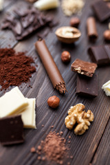 Delicious chocolate on wooden background