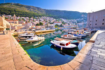 Fototapeta na wymiar Dubrovnik harbor and city walls morning view