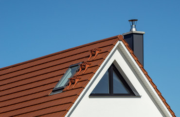 part of a new house with roof and facade