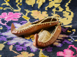 Opanci, traditional handcrafted leather folk shoes, a part of the Serbian national costume, are...