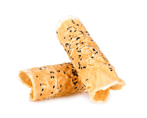 Black sesame chips on white background