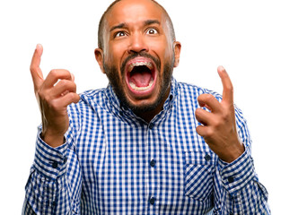 African american man with beard terrified and nervous expressing anxiety and panic gesture, overwhelmed isolated over white background