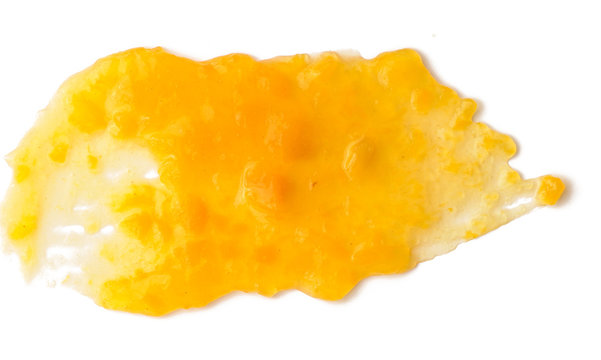 Apricot jam spread isolated over white background