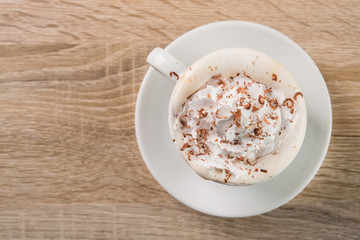 Tasty coffee cup frappe with cream