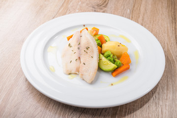 Boiled fish with vegetables